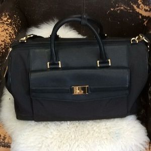 Tumi  ...travel overnight bag tremendous. New !!!